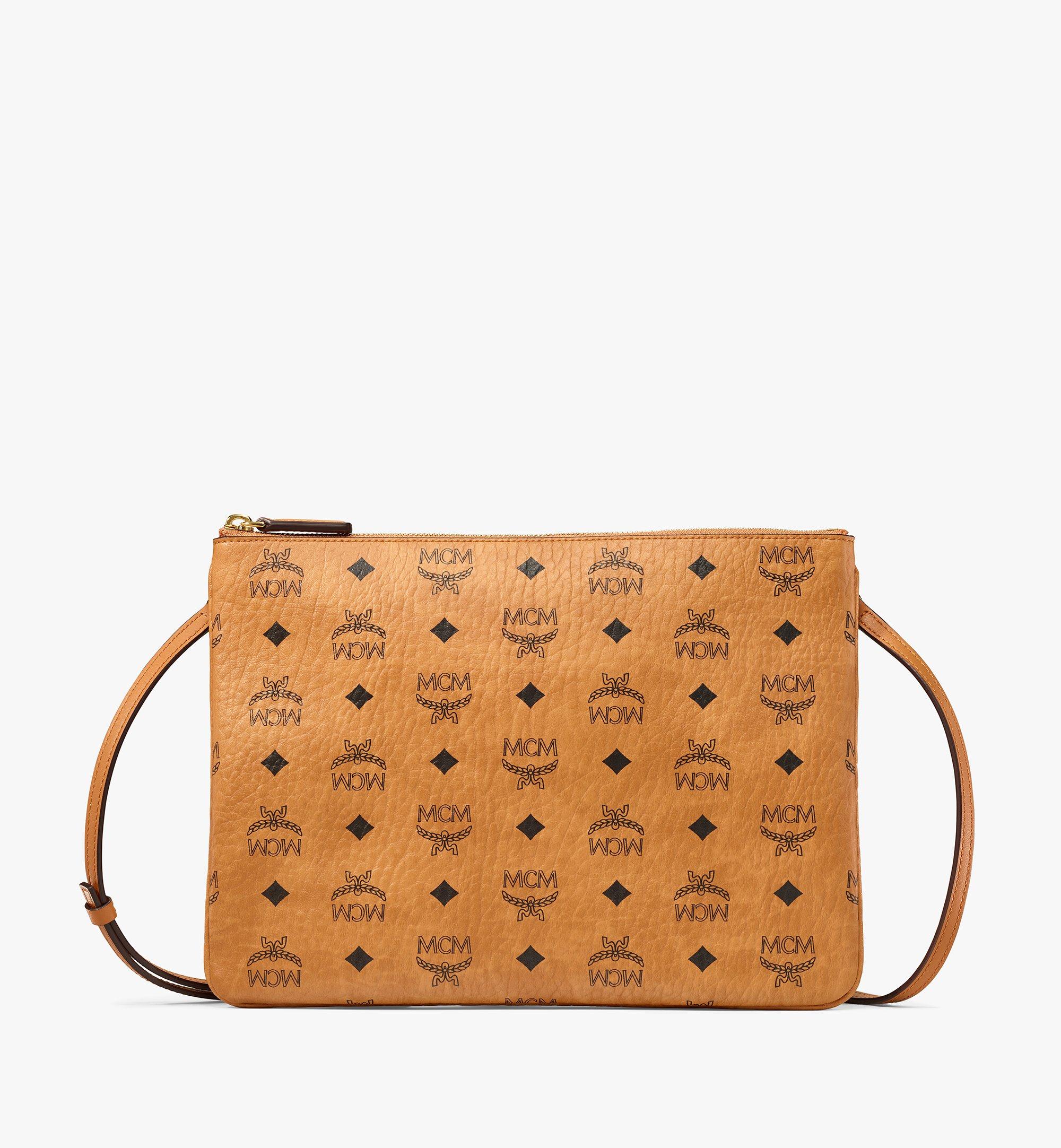 Mcm pochette beige new arrivals